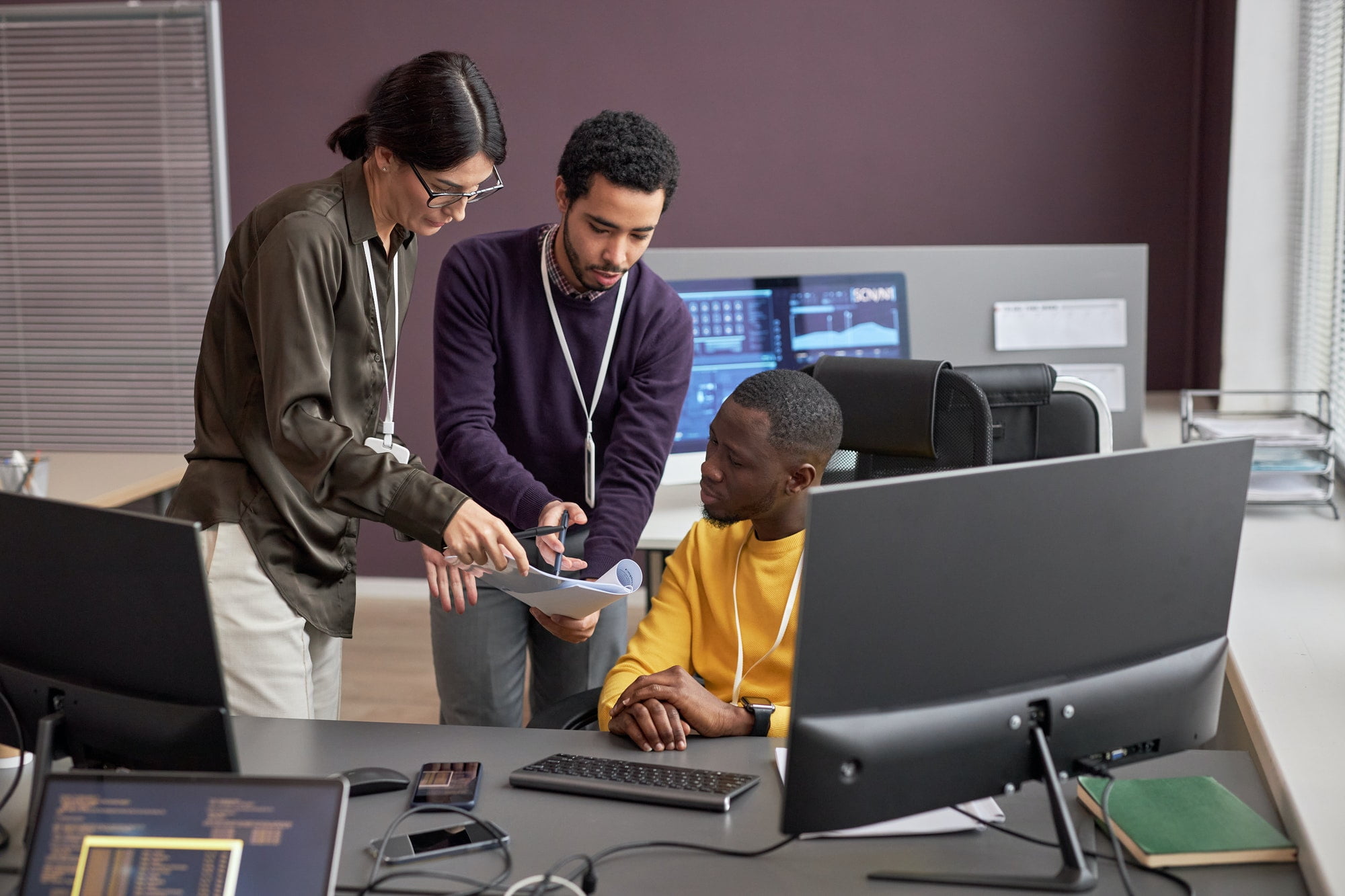 Business people collaborating on project in IT development office
